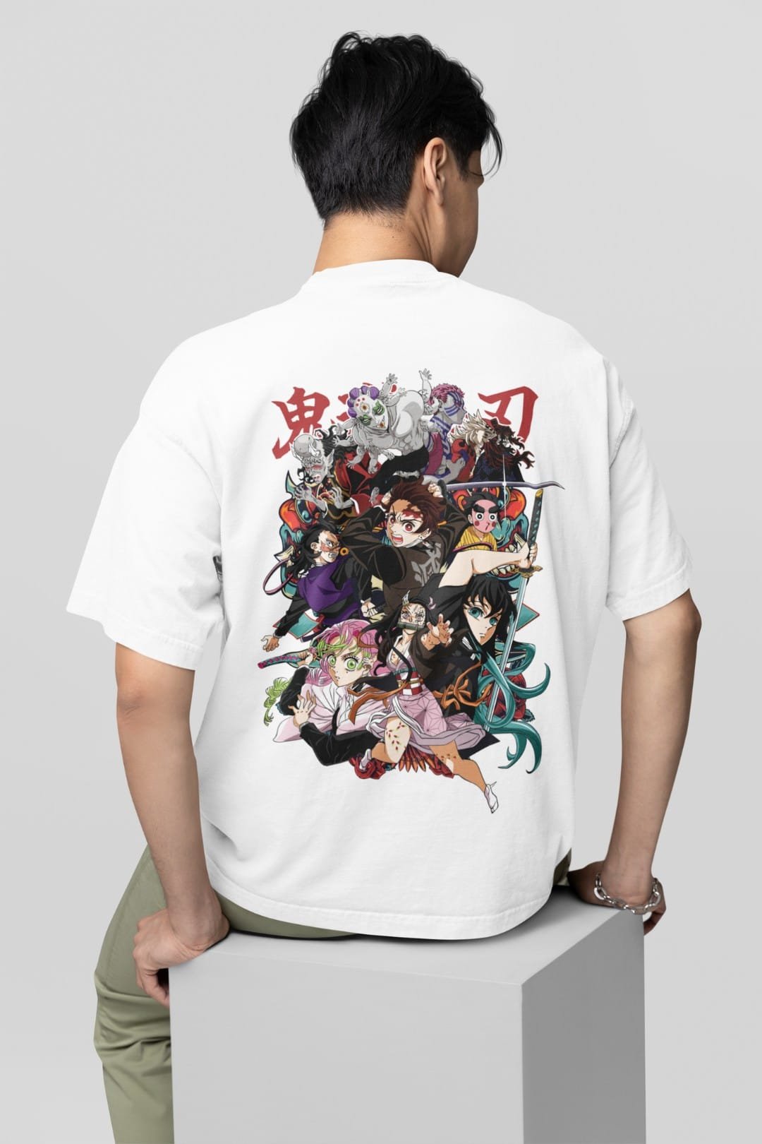 Back view of a white Dudle oversized anime graphic T-shirt